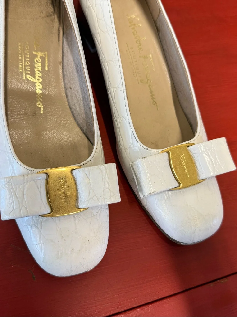 Salvatore Ferragamo White Leather Vara Bow Flats with Gold Accent